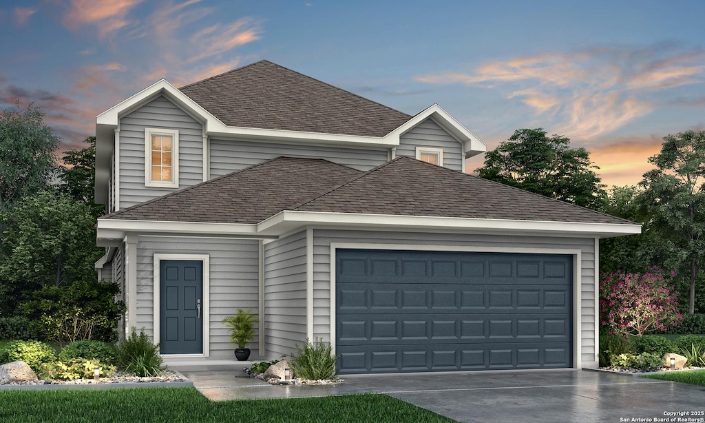 2650 Downsbury Rd, New Braunfels, TX 78130 - view of front of house featuring an attached garage, a shingled roof, and driveway