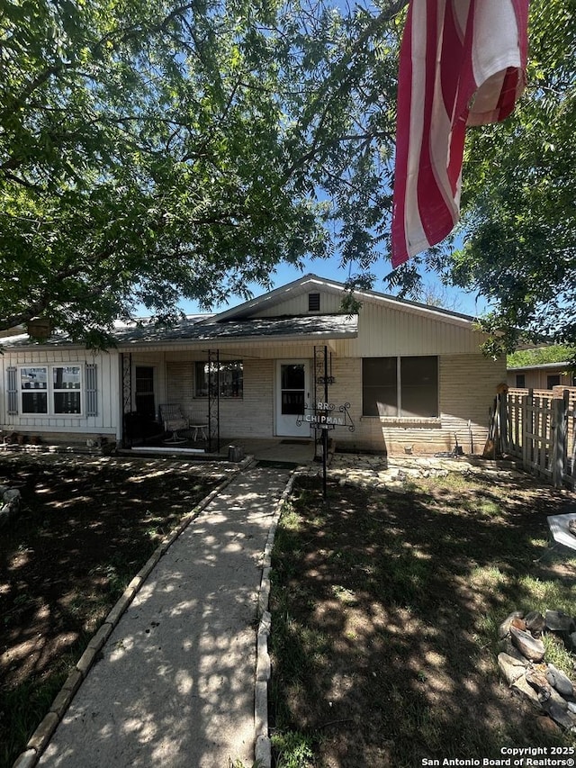 view of front of property with fence