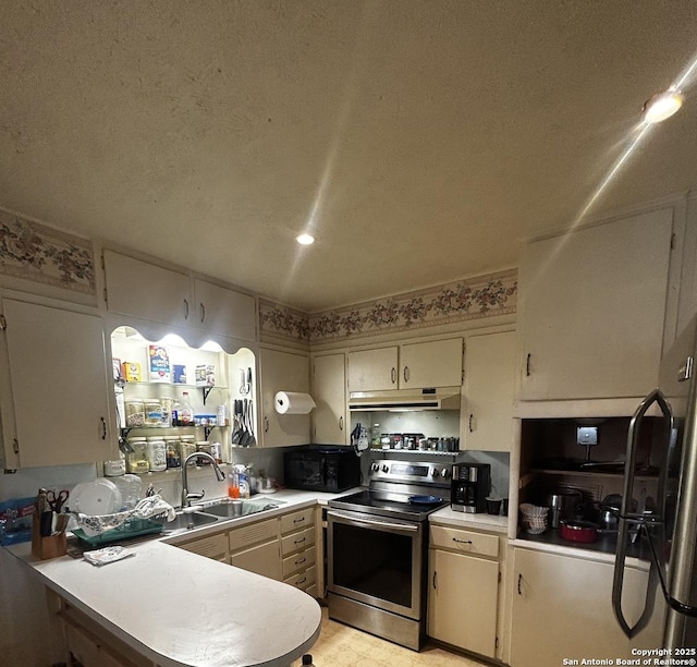 kitchen featuring stainless steel range with electric cooktop, under cabinet range hood, light countertops, a sink, and black microwave