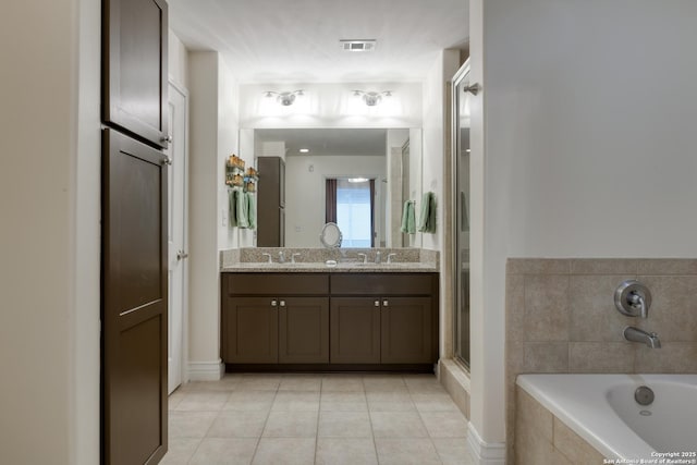 full bath featuring vanity, a bath, tile patterned floors, an enclosed shower, and visible vents