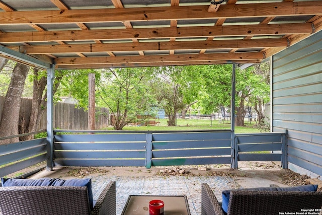 view of patio / terrace featuring fence