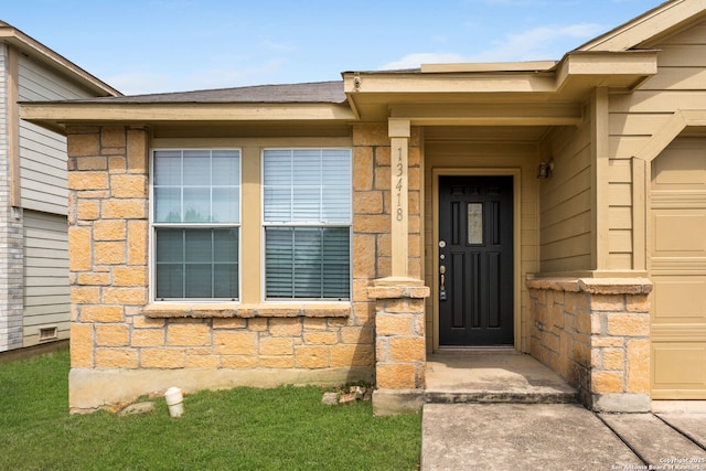 entrance to property with stone siding