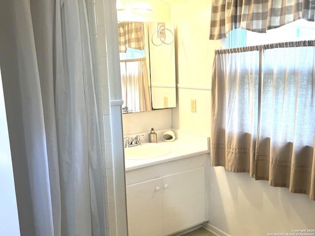 full bath with a shower with curtain and vanity