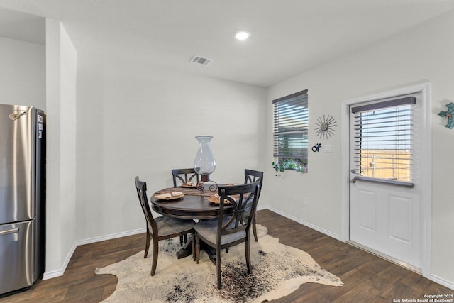 dining space featuring recessed lighting, wood finished floors, visible vents, and baseboards