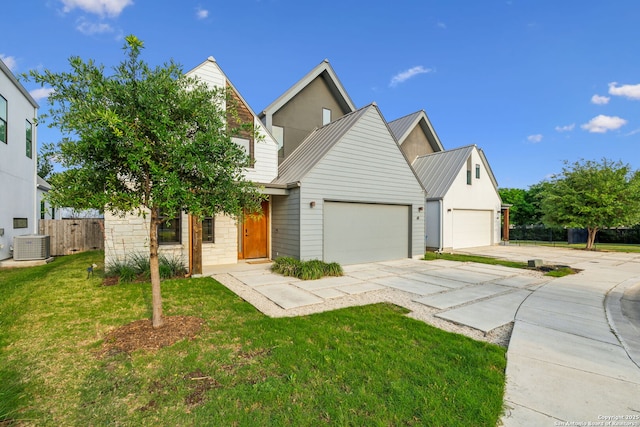 611 Simple Way, San Antonio, TX 78209 - traditional-style house with fence, cooling unit, driveway, a front yard, and metal roof