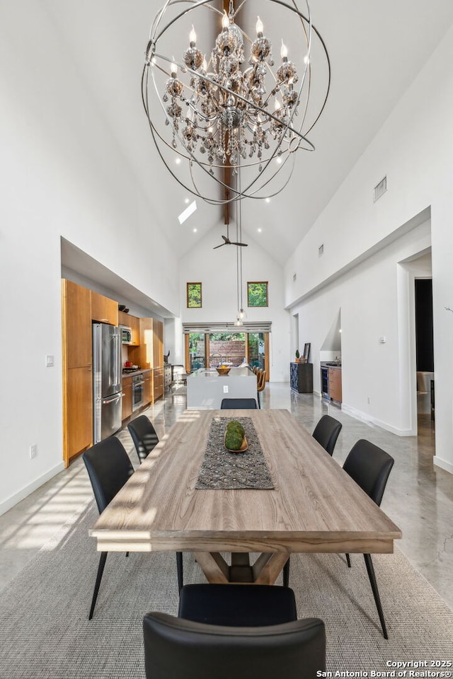 611 Simple Way, San Antonio, TX 78209 - dining space featuring high vaulted ceiling, baseboards, a notable chandelier, visible vents, and recessed lighting