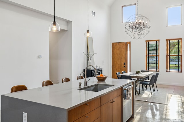 611 Simple Way, San Antonio, TX 78209 - kitchen featuring an inviting chandelier, stainless steel dishwasher, a sink, and plenty of natural light