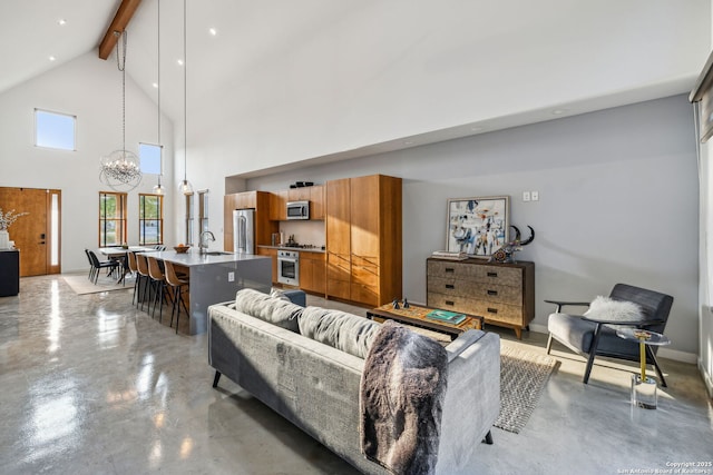 611 Simple Way, San Antonio, TX 78209 - living area featuring beam ceiling, recessed lighting, a notable chandelier, concrete floors, and high vaulted ceiling