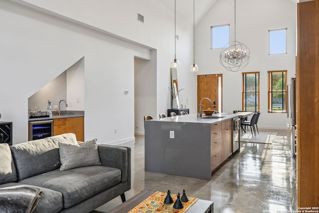 611 Simple Way, San Antonio, TX 78209 - kitchen featuring finished concrete flooring, open floor plan, a sink, and modern cabinets