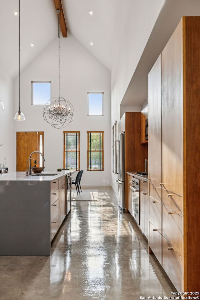 611 Simple Way, San Antonio, TX 78209 - kitchen featuring high vaulted ceiling, modern cabinets, an inviting chandelier, appliances with stainless steel finishes, and beam ceiling