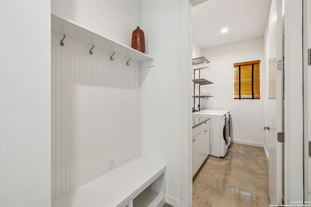 611 Simple Way, San Antonio, TX 78209 - mudroom featuring concrete floors, baseboards, recessed lighting, and separate washer and dryer