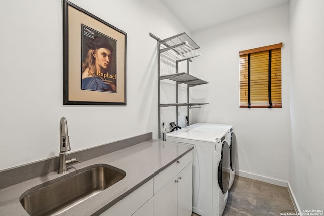 611 Simple Way, San Antonio, TX 78209 - laundry room with separate washer and dryer, baseboards, a sink, and cabinet space