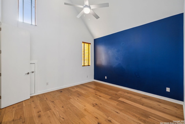 611 Simple Way, San Antonio, TX 78209 - spare room with high vaulted ceiling, ceiling fan, baseboards, and light wood-style flooring