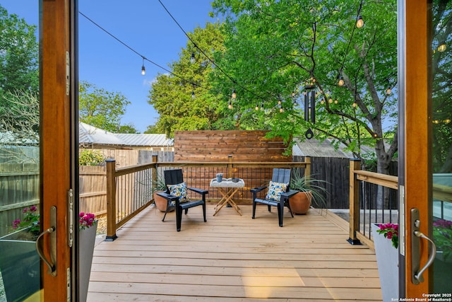 611 Simple Way, San Antonio, TX 78209 - wooden deck featuring fence