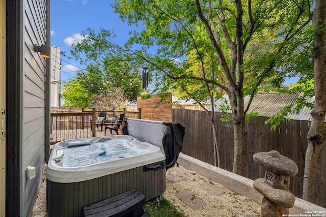 611 Simple Way, San Antonio, TX 78209 - deck with fence and a hot tub