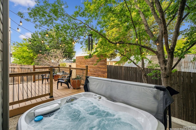 611 Simple Way, San Antonio, TX 78209 - wooden deck featuring a fenced backyard and a covered hot tub