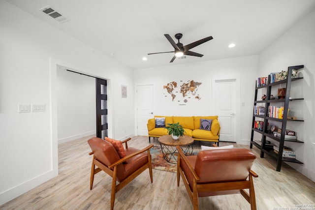2114 Village, San Antonio, TX 78251 - living area with light wood-style flooring, baseboards, visible vents, recessed lighting, and a ceiling fan