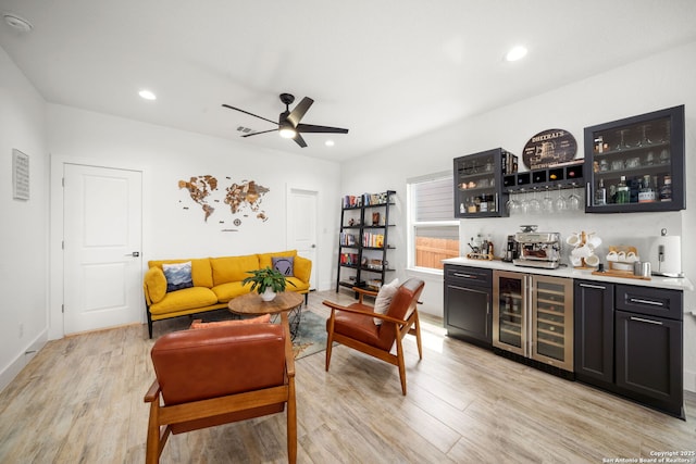 2114 Village, San Antonio, TX 78251 - interior space featuring wine cooler, light wood-style floors, ceiling fan, and wet bar