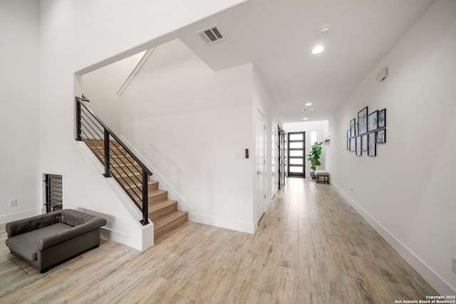2114 Village, San Antonio, TX 78251 - entrance foyer featuring recessed lighting, wood finished floors, visible vents, baseboards, and stairs