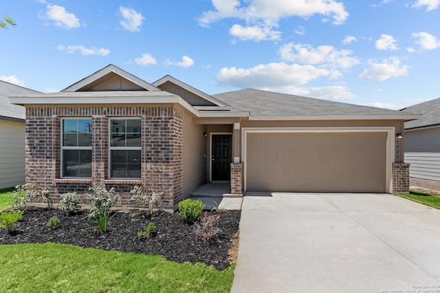 15451 Jake Xing, San Antonio, TX 78245 - ranch-style home with brick siding, concrete driveway, and an attached garage