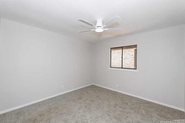 empty room featuring baseboards, a ceiling fan, and carpet flooring