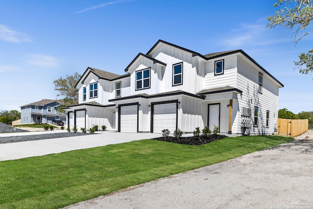 modern farmhouse with an attached garage, driveway, board and batten siding, and a front lawn