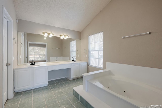full bath with a whirlpool tub, vaulted ceiling, a healthy amount of sunlight, and a sink