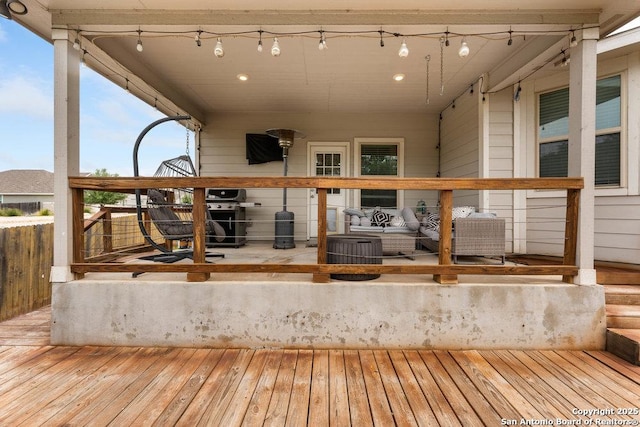 wooden terrace with grilling area