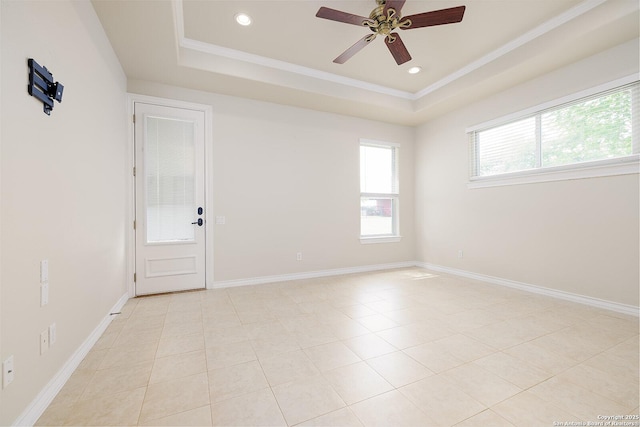 empty room featuring ceiling fan, ornamental molding, recessed lighting, and a raised ceiling