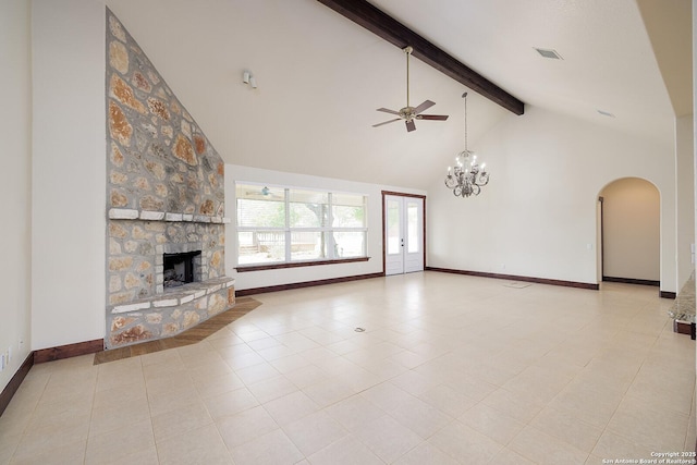 unfurnished living room featuring a stone fireplace, visible vents, arched walkways, beamed ceiling, and high vaulted ceiling
