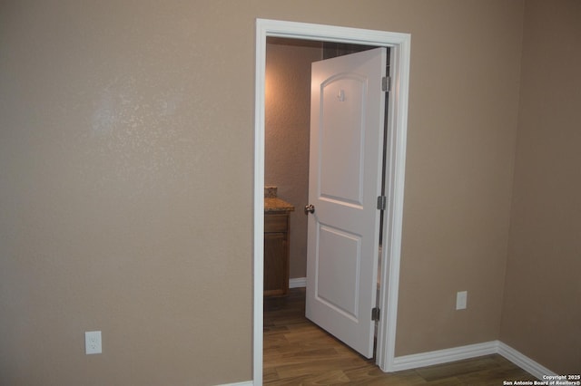 18687 Rolling Mdw, Lytle, TX 78052 - interior space with baseboards and wood finished floors