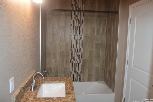 18687 Rolling Mdw, Lytle, TX 78052 - bathroom with shower / bathtub combination and a sink