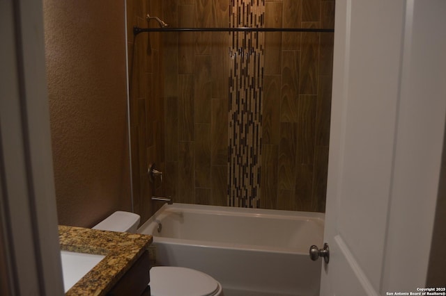 18687 Rolling Mdw, Lytle, TX 78052 - bathroom with shower / bath combination, a textured wall, toilet, and vanity