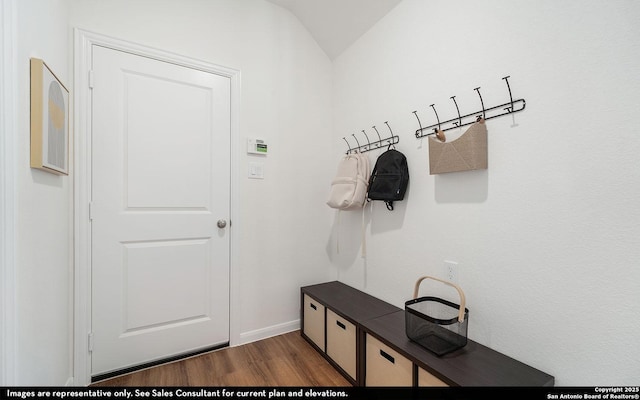 mudroom featuring baseboards and wood finished floors