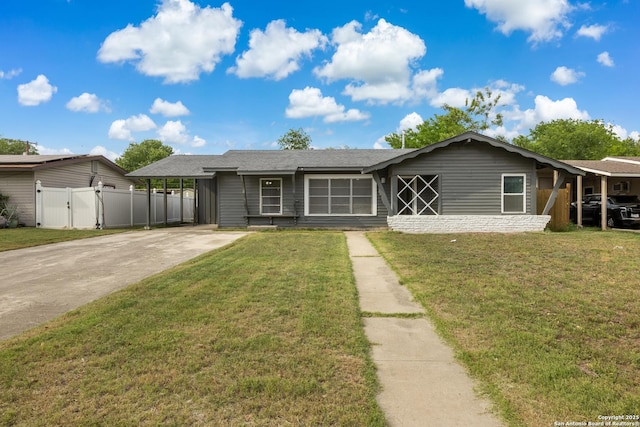 5431 Stonybrook, San Antonio, TX 78242 - single story home featuring a carport, a gate, concrete driveway, fence, and a front yard