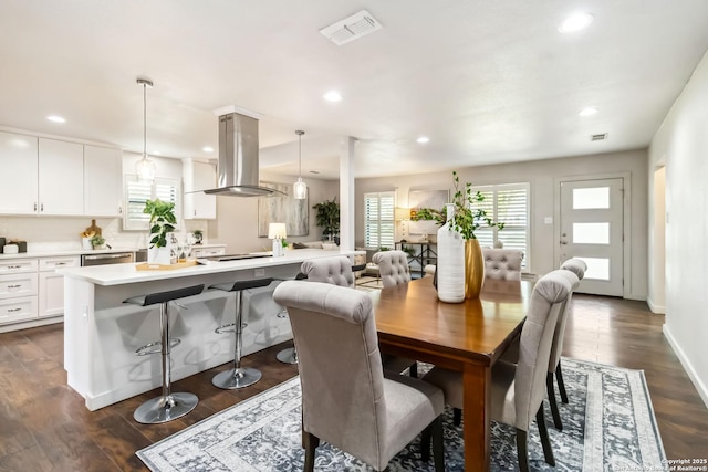 dining space featuring recessed lighting, visible vents, and dark wood-style floors