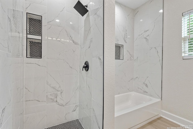 114 S Minter St, San Antonio, TX 78207 - full bathroom featuring walk in shower, a bathing tub, baseboards, and wood finished floors