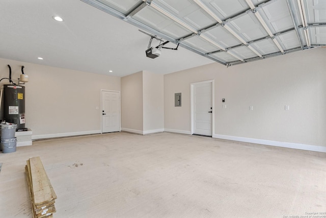 114 S Minter St, San Antonio, TX 78207 - garage with electric water heater, electric panel, a garage door opener, baseboards, and recessed lighting