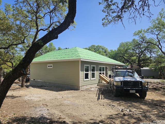 894 Luehlfing, Canyon Lake, TX 78133 - view of home's exterior featuring metal roof
