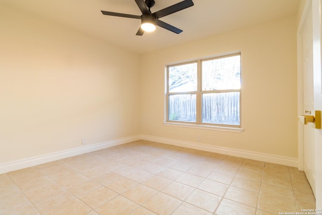 905 E Inez, Beeville, TX 78102 - spare room featuring a ceiling fan, baseboards, and light tile patterned floors