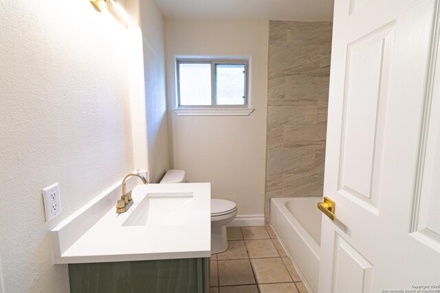 905 E Inez, Beeville, TX 78102 - bathroom with tile patterned floors, a bathtub, toilet, walk in shower, and vanity