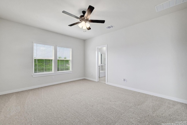 6031 Calgary Park, San Antonio, TX 78233 - spare room featuring a ceiling fan, baseboards, and light colored carpet