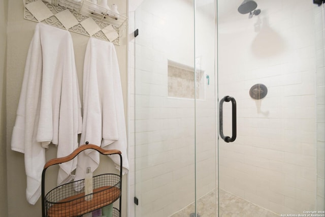 full bathroom featuring a shower stall