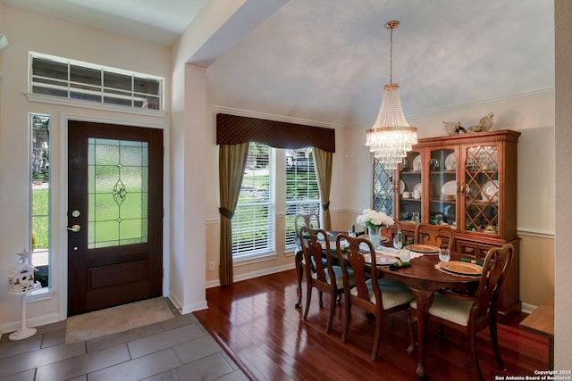 1106 Crystal Spg, San Antonio, TX 78258 - dining space with baseboards, wood finished floors, a chandelier, and a healthy amount of sunlight