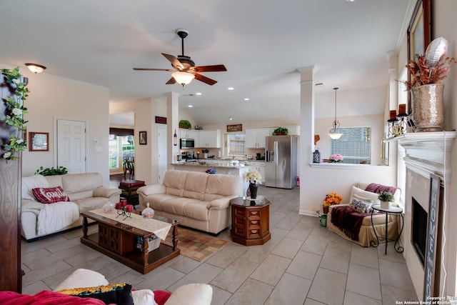 1106 Crystal Spg, San Antonio, TX 78258 - living room with recessed lighting, lofted ceiling, a ceiling fan, and a fireplace