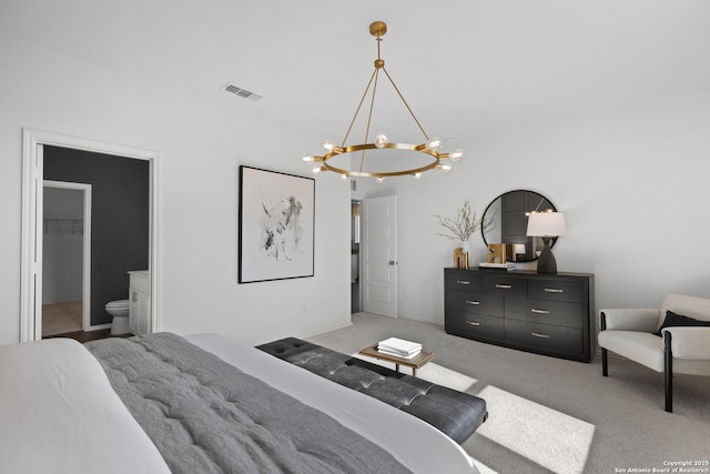 bedroom with light colored carpet, a chandelier, and visible vents