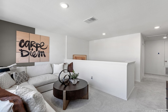 living area with baseboards, light carpet, visible vents, and recessed lighting