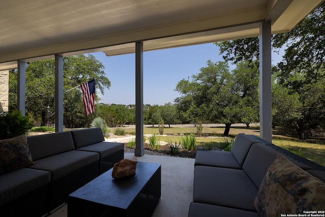 sunroom with an outdoor hangout area