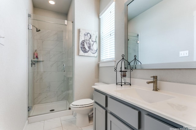 full bath featuring a stall shower, vanity, marble finish floor, toilet, and recessed lighting