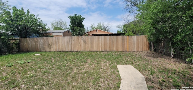 view of yard featuring a fenced backyard